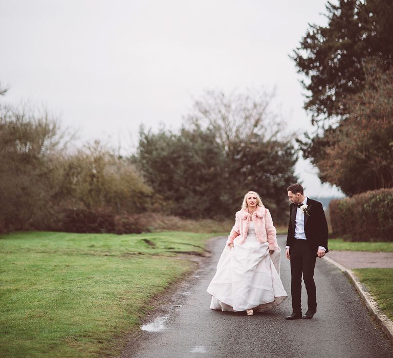 Bride in Organza Justin Alexander Gown &amp; Blush Pink Faux Fur Coverup | Groom in Black Tie Suit | Blush Pink &amp; Red, Christmas, Winter Wedding at Coltsfoot Country Retreat | Lemonade Pictures