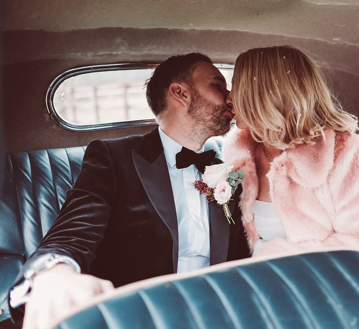 Bride in Organza Justin Alexander Gown &amp; Blush Pink Faux Fur Coverup | Groom in Black Tie Suit | Blush Pink &amp; Red, Christmas, Winter Wedding at Coltsfoot Country Retreat | Lemonade Pictures