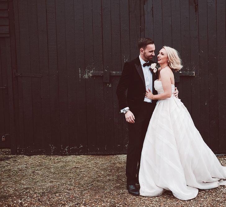 Bride in Organza Justin Alexander Gown | Groom in Black Tie Suit | Blush Pink &amp; Red, Christmas, Winter Wedding at Coltsfoot Country Retreat | Lemonade Pictures