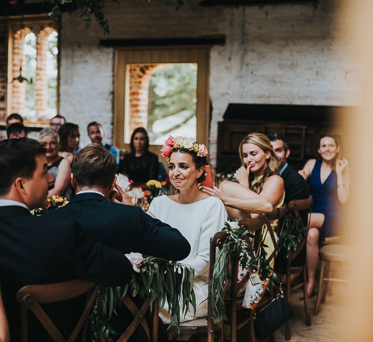 Bride in Halfpenny London Separates of Laura Top with Cowl Back and Long Sleeves, Silk Cami and Laser Cut Palm Skirt | Flower Crown with Pink Peony | 'Frida Kahlo' Flower Crown, Halfpenny London Bridal Separates and Colourful Bouquets with Peonies for Suffolk Wedding | From The Smiths Photography