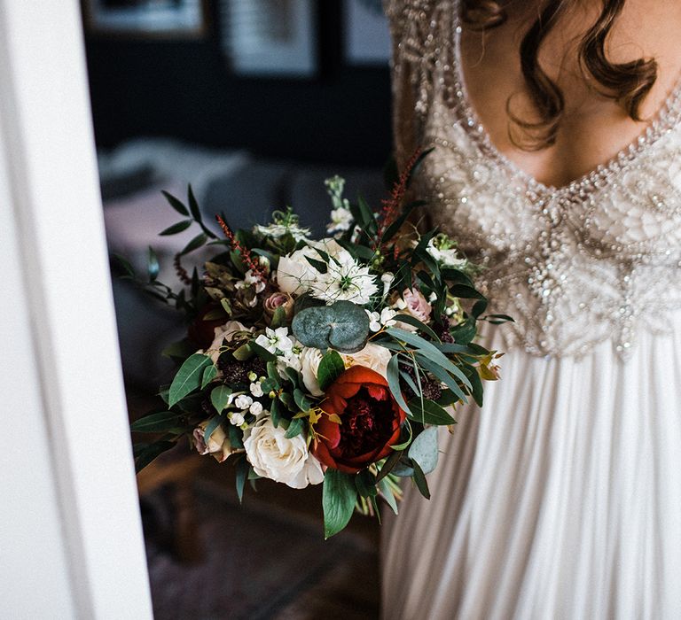 Anna Campbell Wedding Dress With Red and Bridal White Bouquet