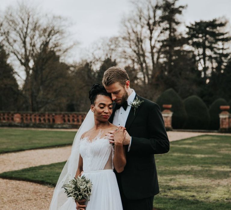 Stylish bride and groom at Winter wedding