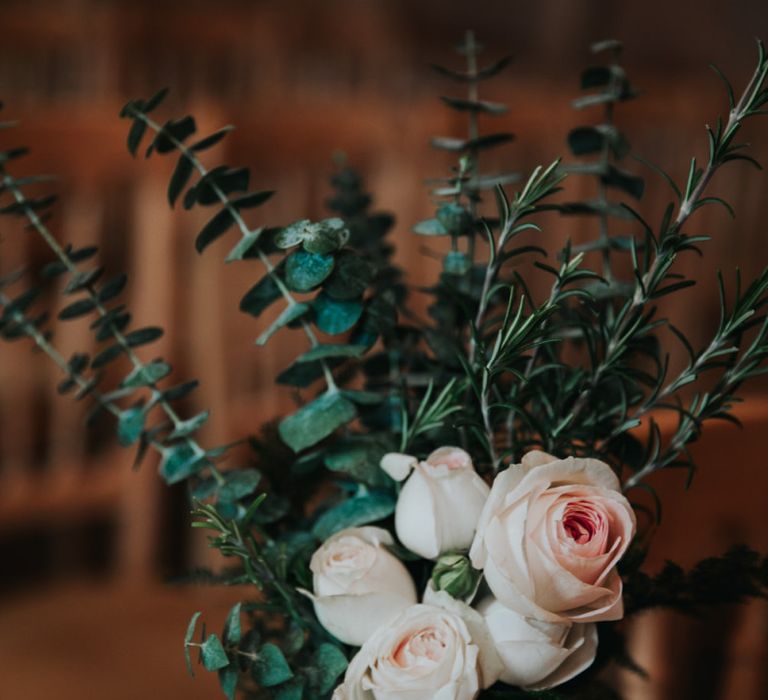 blush pink roses and eucalyptus aisle wedding flowers