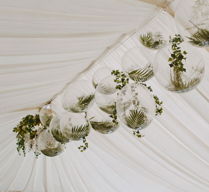 Clear Balloons filled with Greenery and Foliage