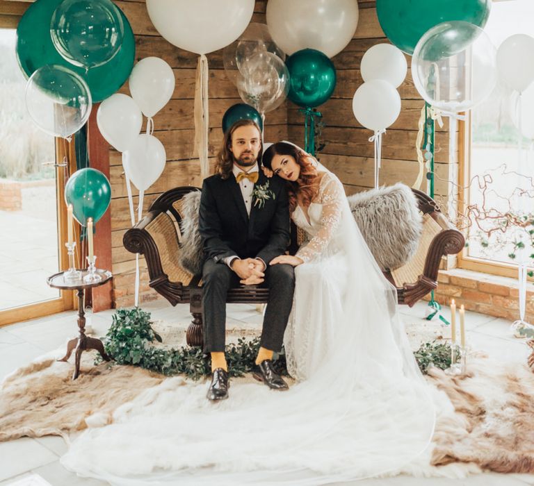 Green and White Giant Balloon Wedding Decor with Bride in  Lace Wedding Dress and Groom in Bow Tie