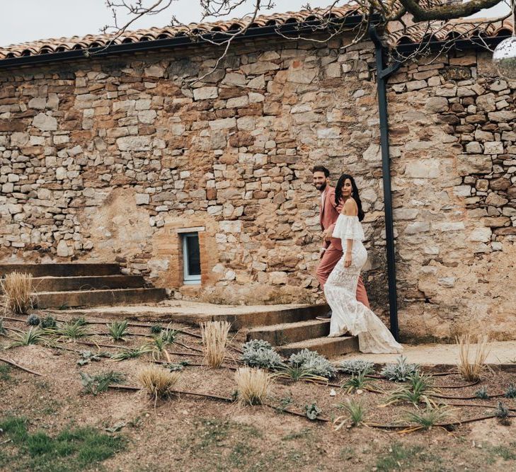 Bride and Groom Walking Up the Steps of Barcelona Wedding Venue This Must Be The Place