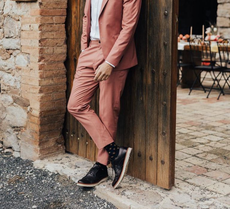 Groom in Coral Suit and White Living Coral Shirt