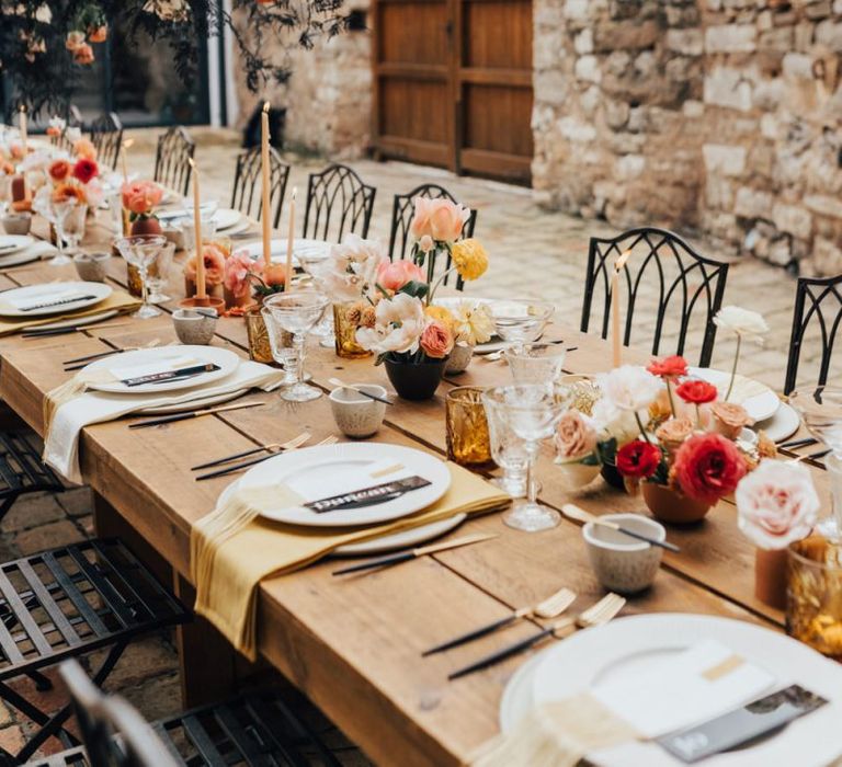 Rustic Wedding Reception Table with Living Coral Flowers and Contemporary Decoration