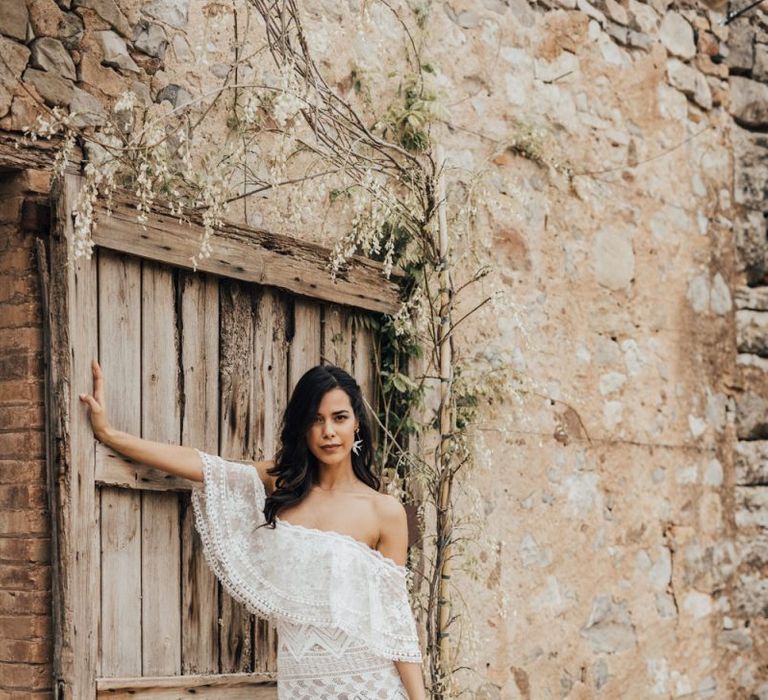 Bride in Bardot Grace Loves Lace Wedding Dress