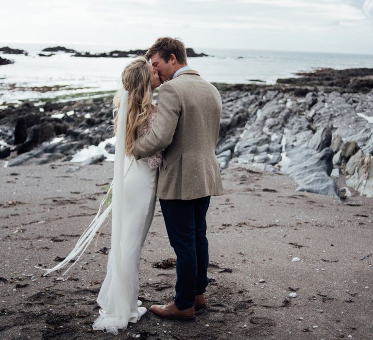 Bride and groom intimate beach wedding portrait