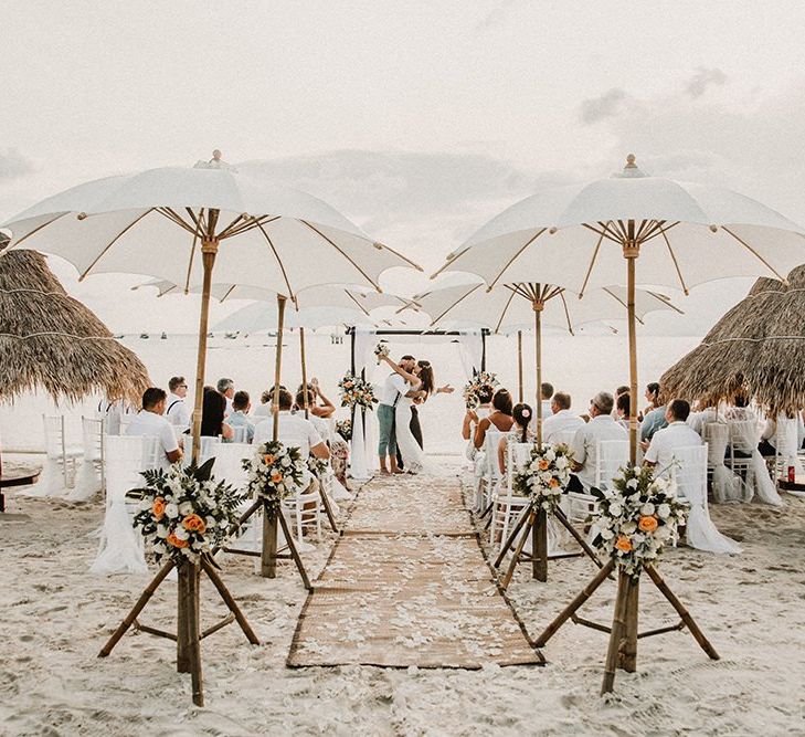 Beach Weddings Ceremony with Parasols