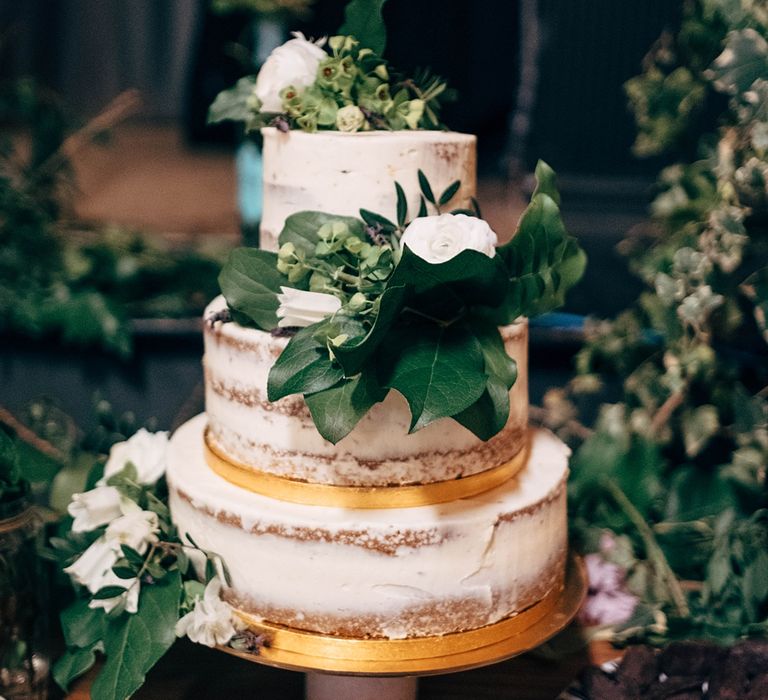 Semi Naked Wedding Cake // Beautiful DIY Village Hall Wedding For Under £5k // Guests Made Food // Bride Wears Needle &amp; Thread // Images By Dale Weeks Photography