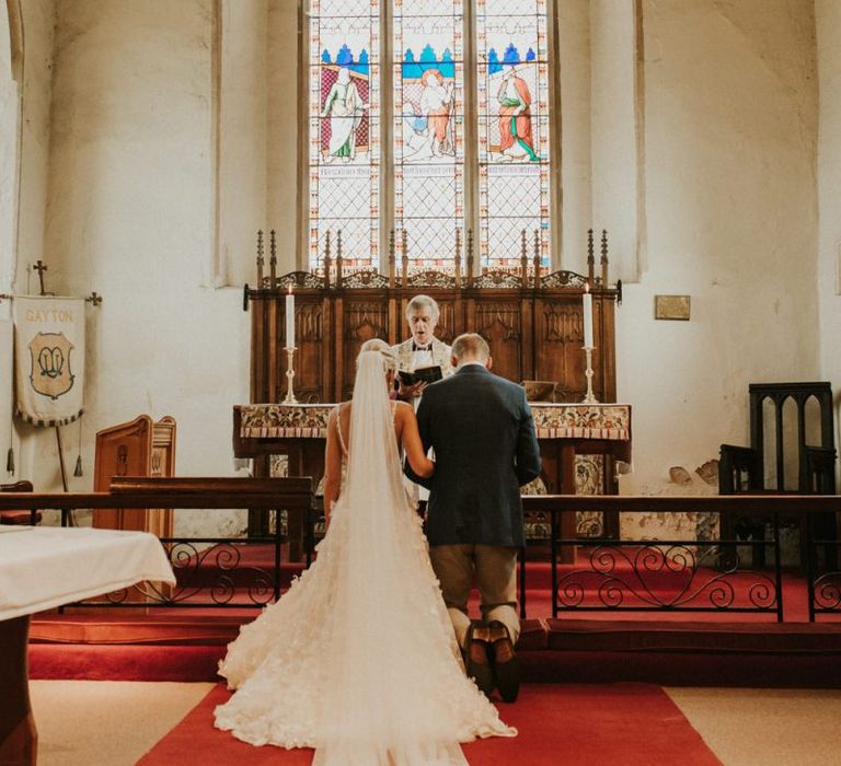 Bride and groom at the altar of their church wedding ceremony