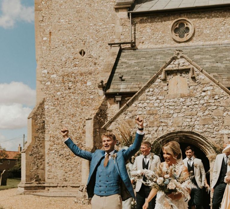 Bride and groom outside the church