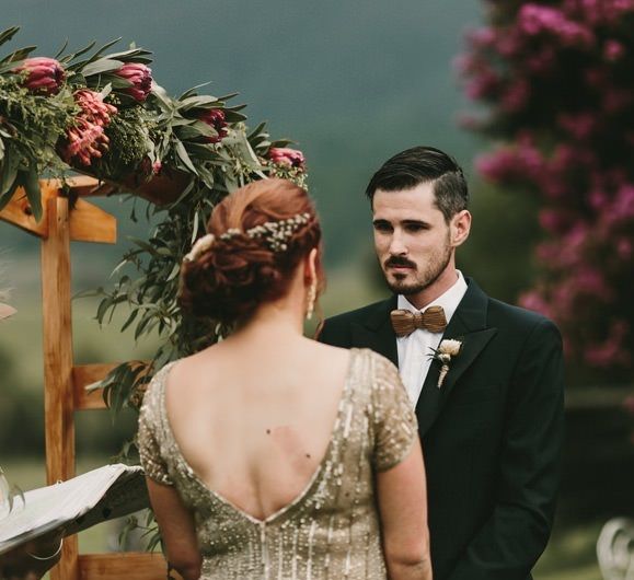 Bride and Groom Saying Their Vows at an Outdoor Wedding Ceremony