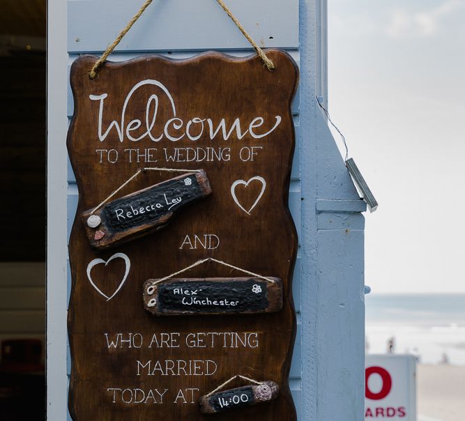 Wooden Welcome Sign | Lusty Glaze Beach Wedding Newquay Cornwall | Alexa Poppe Photography