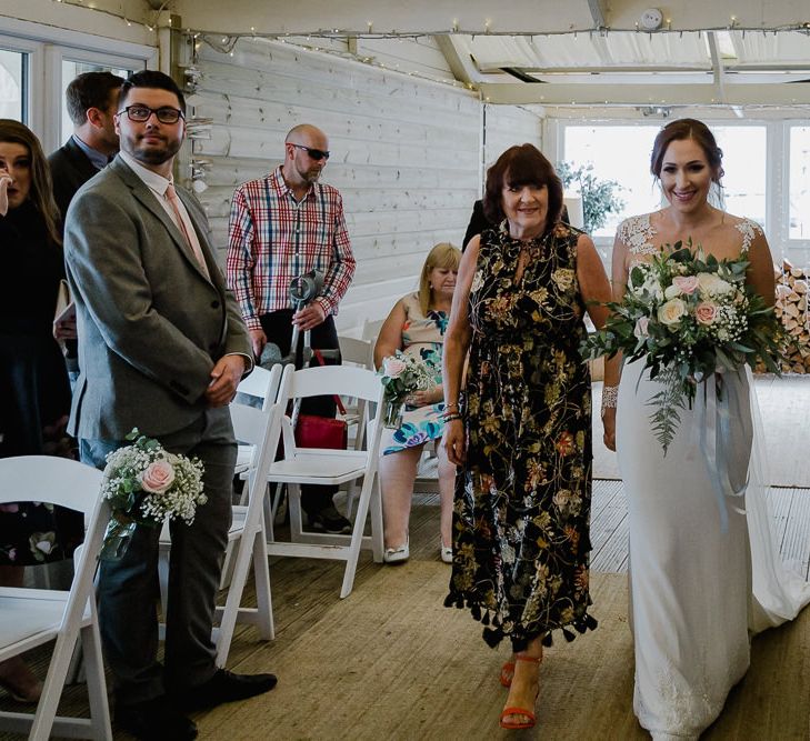 Wedding Ceremony Bridal Entrance in Long Sleeve Lace Martina Liana Wedding Dress Escorted by Mother-of-the-Bride | Lusty Glaze Beach Wedding Newquay Cornwall | Alexa Poppe Photography