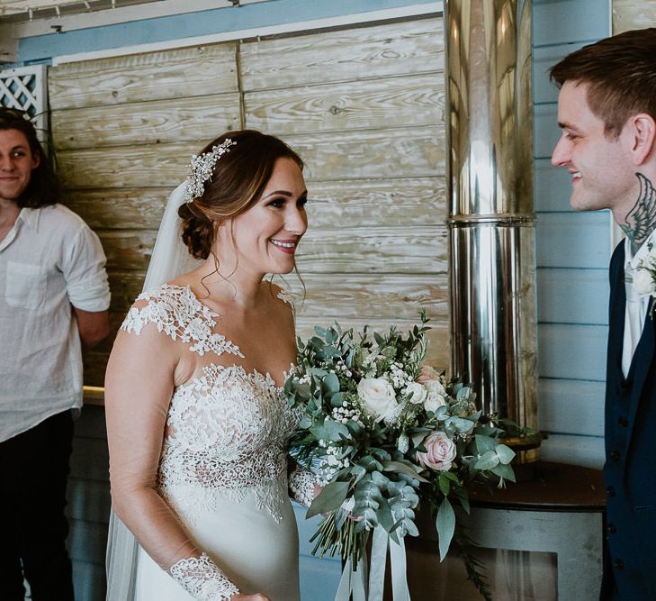 Wedding Ceremony | Bride in Lace Long Sleeve Martina Liana Wedding Dress | Groom in Navy Three-piece Suit | Lusty Glaze Beach Wedding Newquay Cornwall | Alexa Poppe PhotographyLusty Glaze Beach Wedding Newquay Cornwall | Alexa Poppe Photography