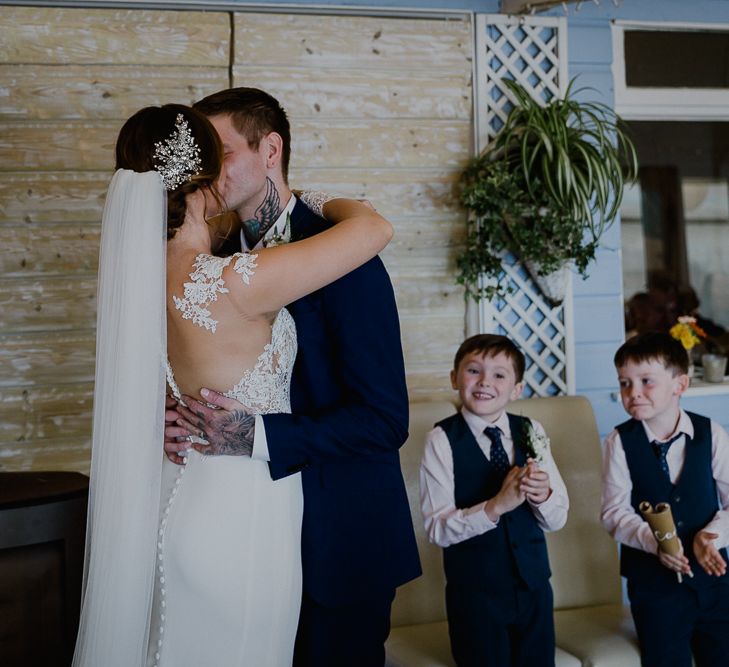 Wedding Ceremony | Bride in Lace Long Sleeve Martina Liana Wedding Dress | Groom in Navy Three-piece Suit | Lusty Glaze Beach Wedding Newquay Cornwall | Alexa Poppe PhotographyLusty Glaze Beach Wedding Newquay Cornwall | Alexa Poppe Photography