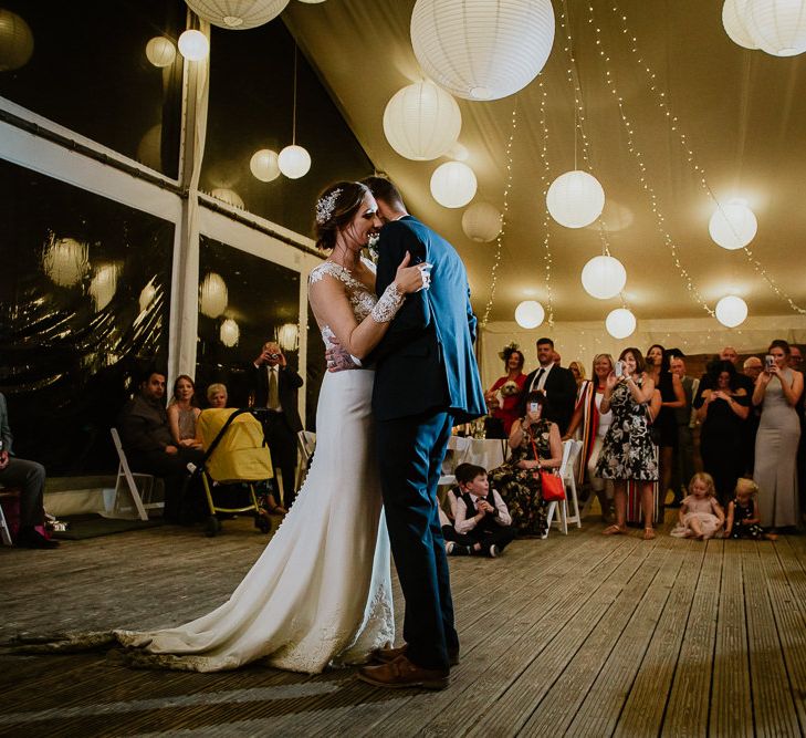 First Dance | Festoon Lights | White Lanterns | Bride in Lace Long Sleeve Martina Liana Wedding Dress | Groom in Navy Three-piece Suit | Lusty Glaze Beach Wedding Newquay Cornwall | Alexa Poppe PhotographyLusty Glaze Beach Wedding Newquay Cornwall | Alexa Poppe Photography