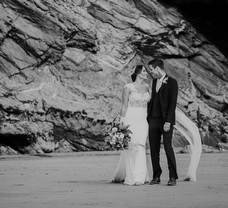 Coastal Portrait | Bride in Lace Long Sleeve Martina Liana Wedding Dress | Groom in Navy Three-piece Suit | Lusty Glaze Beach Wedding Newquay Cornwall | Alexa Poppe PhotographyLusty Glaze Beach Wedding Newquay Cornwall | Alexa Poppe Photography