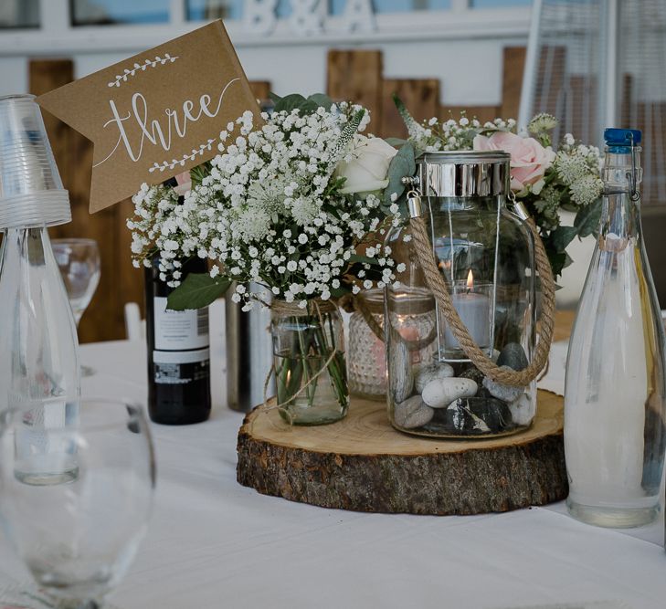 Tree Slice &amp; Flowers in Jars Table Centrepiece | Wedding Decor | Lusty Glaze Beach Wedding Newquay Cornwall | Alexa Poppe Photography