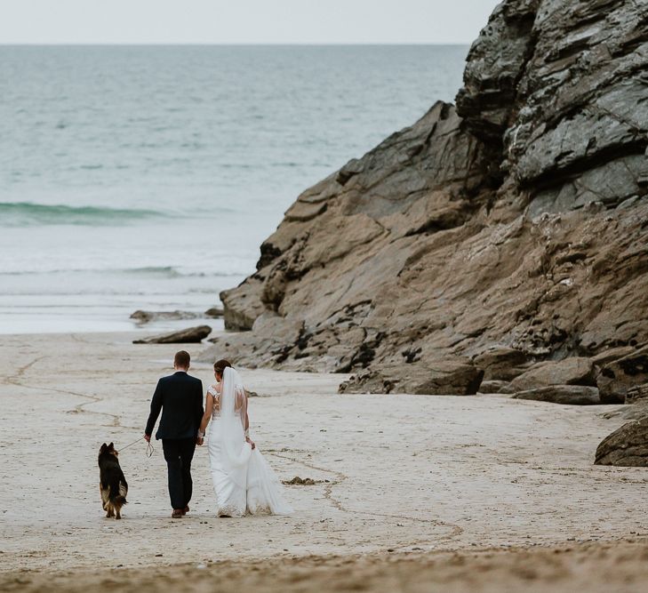 Coastal Portrait | Bride in Lace Long Sleeve Martina Liana Wedding Dress | Groom in Navy Three-piece Suit | Lusty Glaze Beach Wedding Newquay Cornwall | Alexa Poppe PhotographyLusty Glaze Beach Wedding Newquay Cornwall | Alexa Poppe Photography