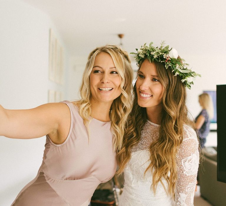 Bride and Bridesmaid Take a Selfie