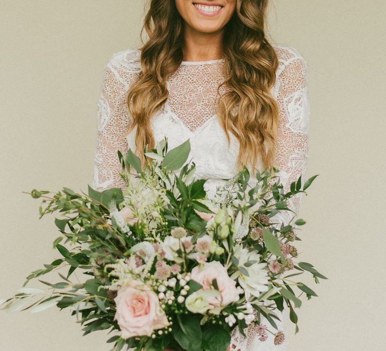 Bride with Down Wavy Hair and Bouquet