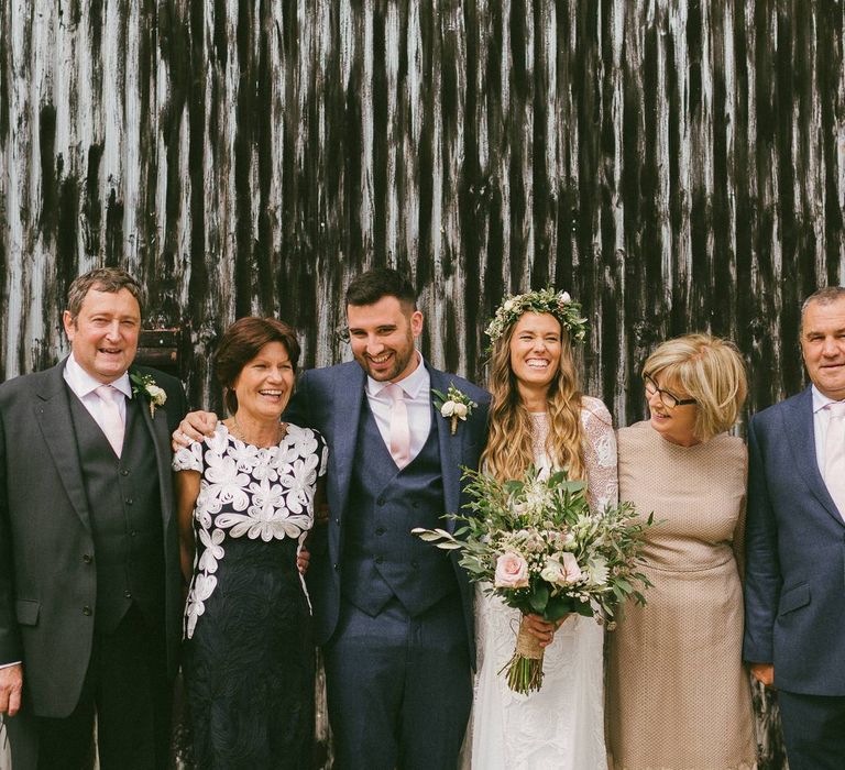 Bride and Groom With Their Respective Families