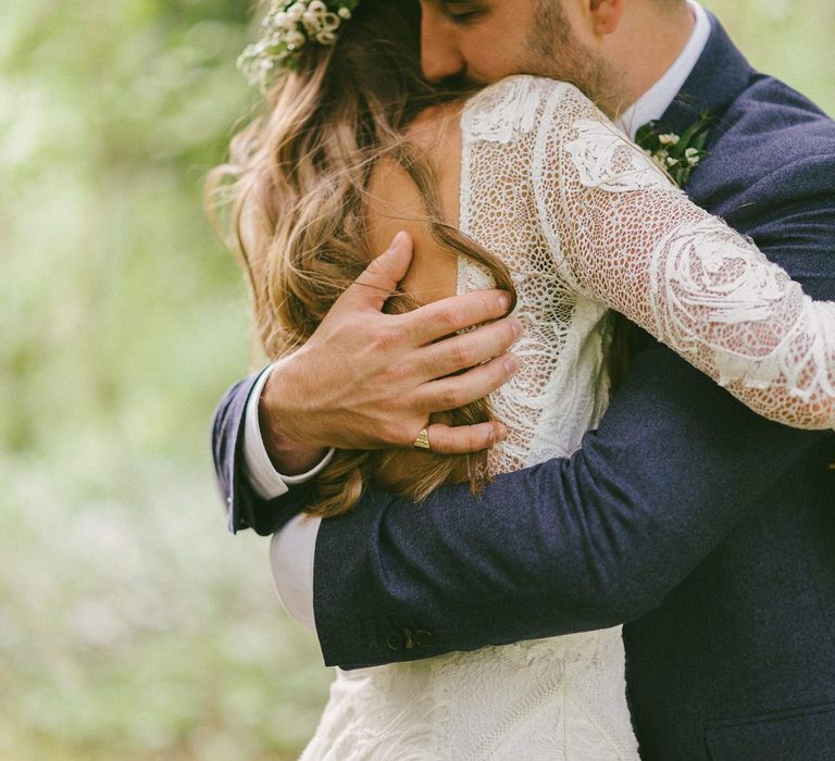 Bride and Groom Embrace