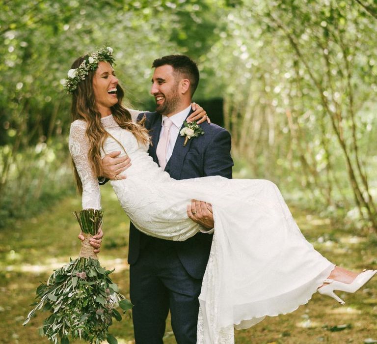 Groom Picks Up Bride Wearing Grace Loves Lace Wedding Dress