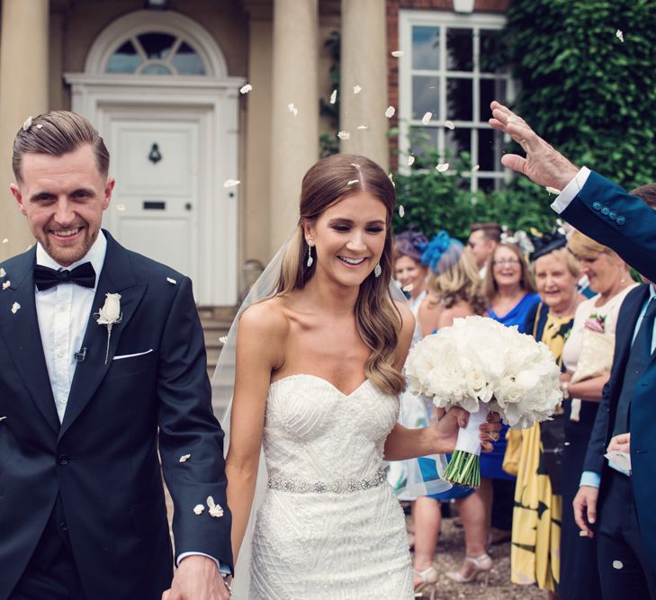 Iscoyd Park Confetti Moment with Bride in Beaded Fishtail Wedding Dress and Groom in Tuxedo