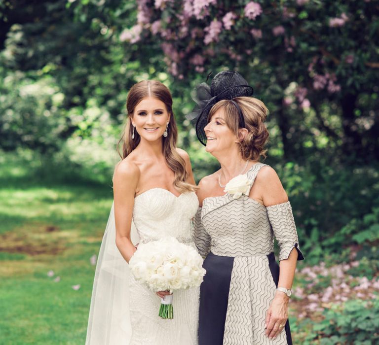 Bride in Beaded Fishtail Wedding Dress and Stylish Mother of The Bride