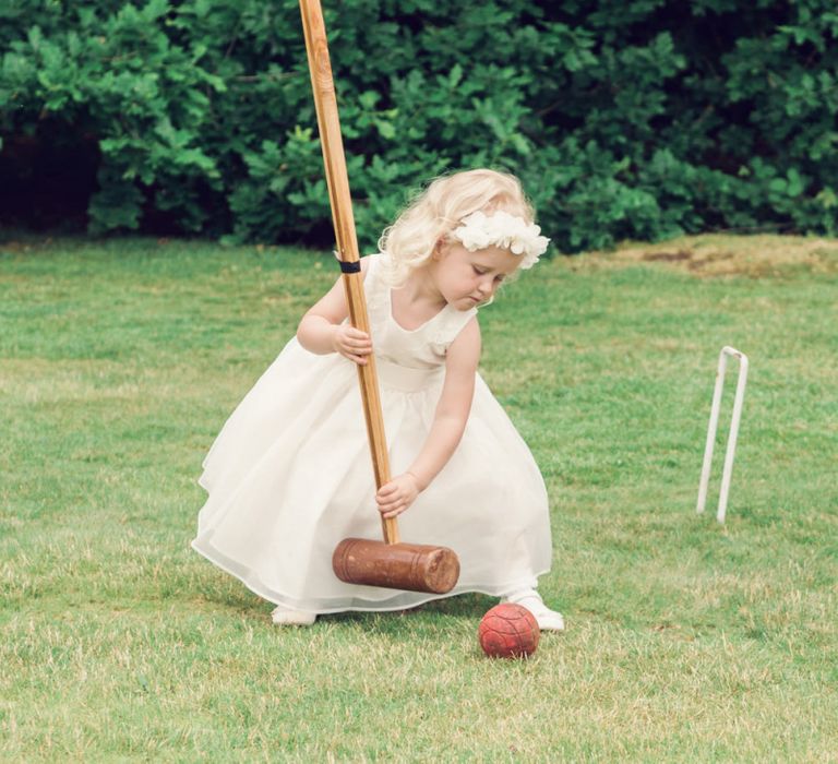 Beautiful Flower Girl Playing  Croquet