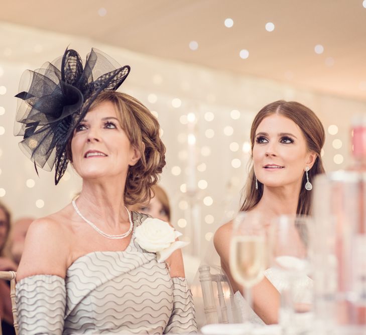 Bride and Mother of the Bride Enjoying the Wedding Reception Speeches