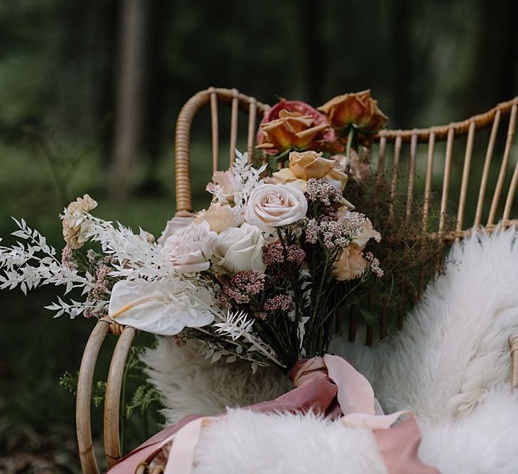 Bamboo Chair with Wedding Bouquet on