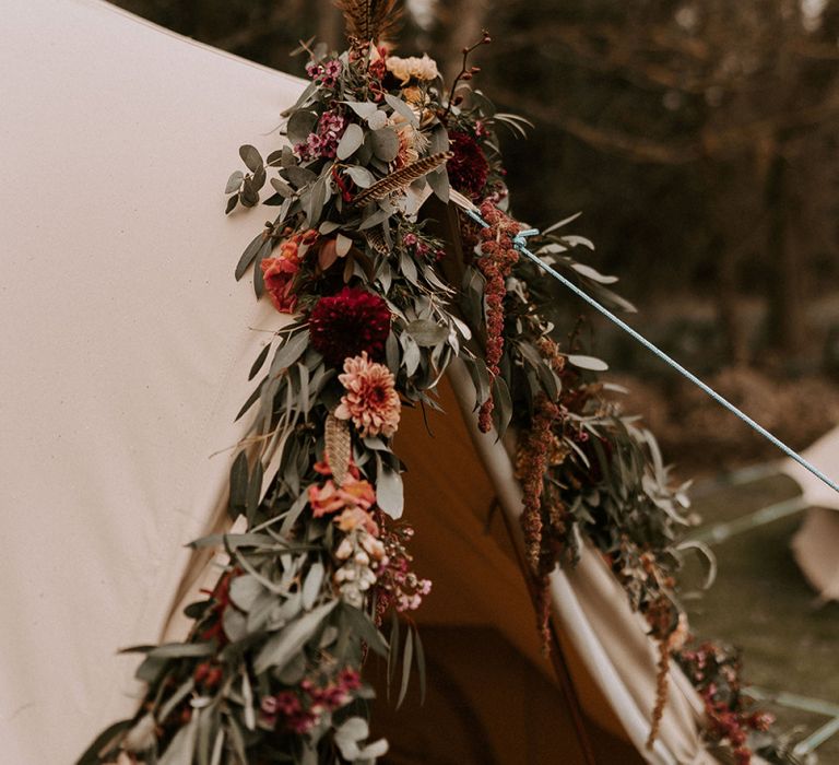 Foliage and Burgundy Floral Arrangement