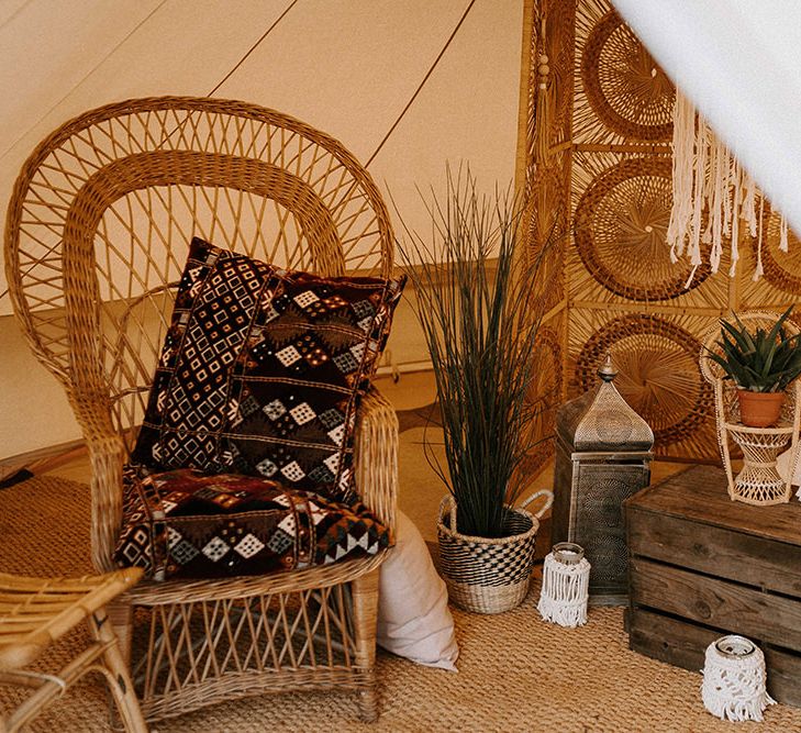 Wicker Chair and Moroccan Cushions for Relaxed Seating Area within w Bell Tent