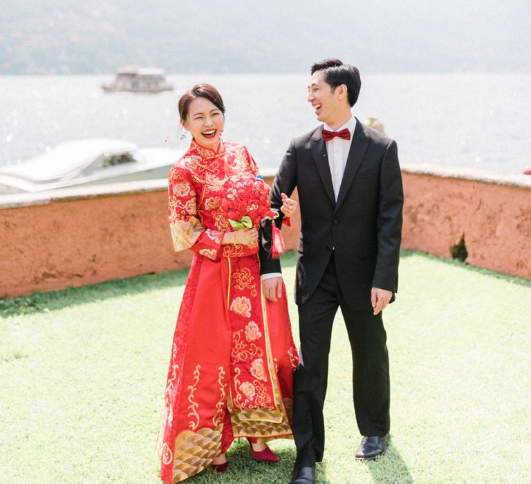 Chinese Tea Ceremony Wedding Bride in Traditional Chinese Red Dress and Groom in Black Tuxedo