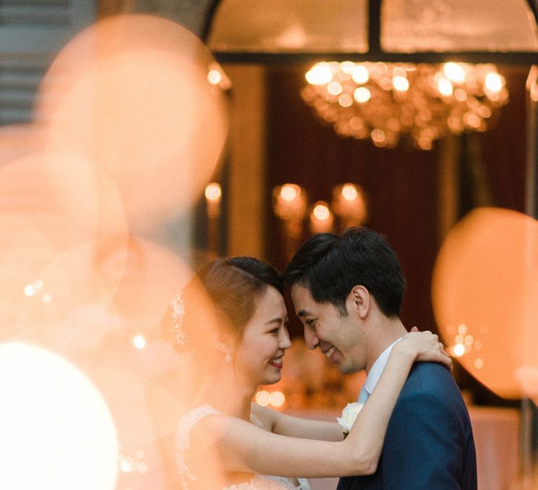 Sparkler Moment with Bride in Anna Kara Wedding Dress and Groom in Three-piece Navy Wedding Suit