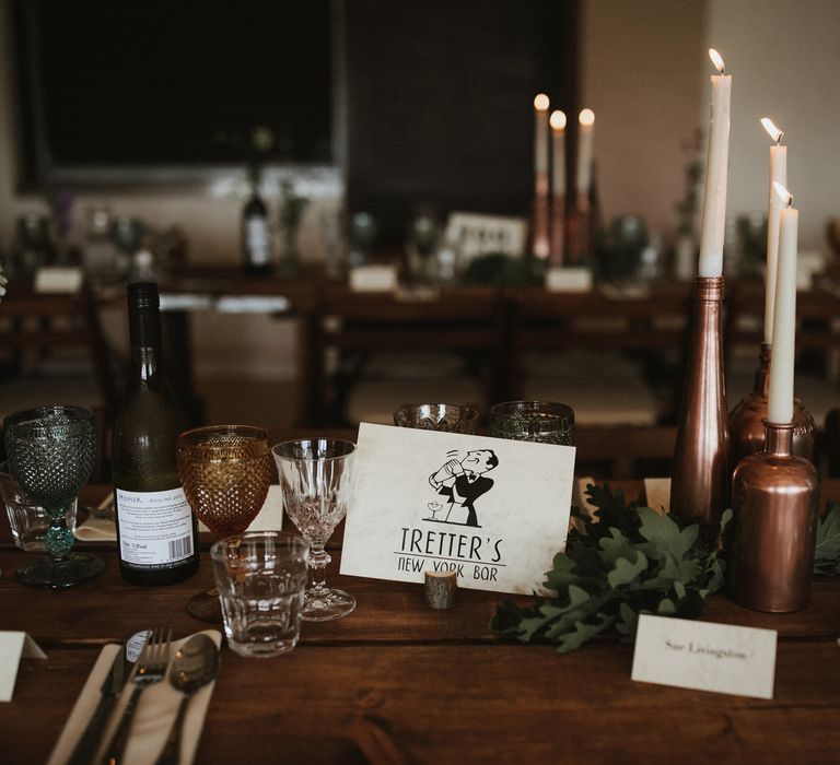 Wooden Trestle Tables With Copper Painted Bottles &amp; Ivory Tapered Candles // James Frost Photography