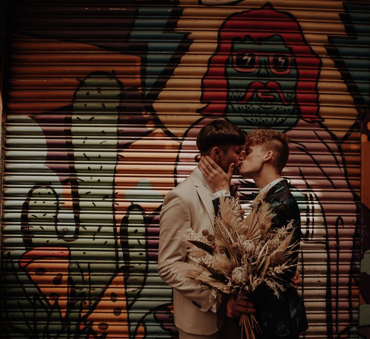 Same sex couple kissing at Manchester elopement