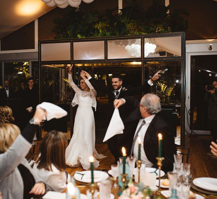 Bride and Groom Entering the Wedding Reception