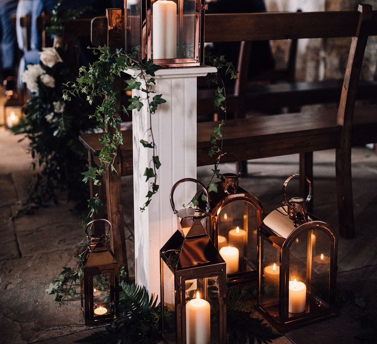 Lanterns And Foliage For Wedding Aisle Decor // Image From Samuel Docker Photography