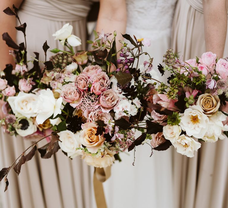 Wedding Bouquets With Pink, Burgundy And Cream Tones // Image By John Barwood Photography