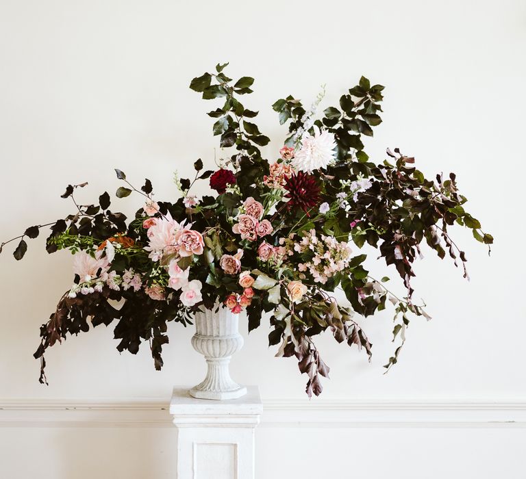 Floral Arrangement In Urn For Wedding // Image By John Barwood Photography