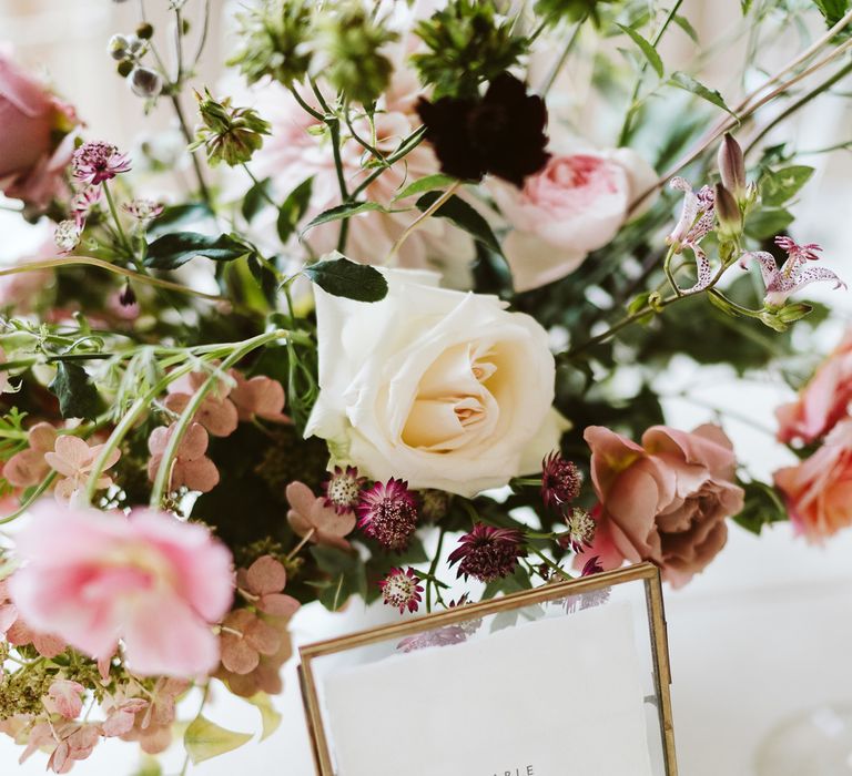 Table Numbers In Gold Frames // Image By John Barwood Photography