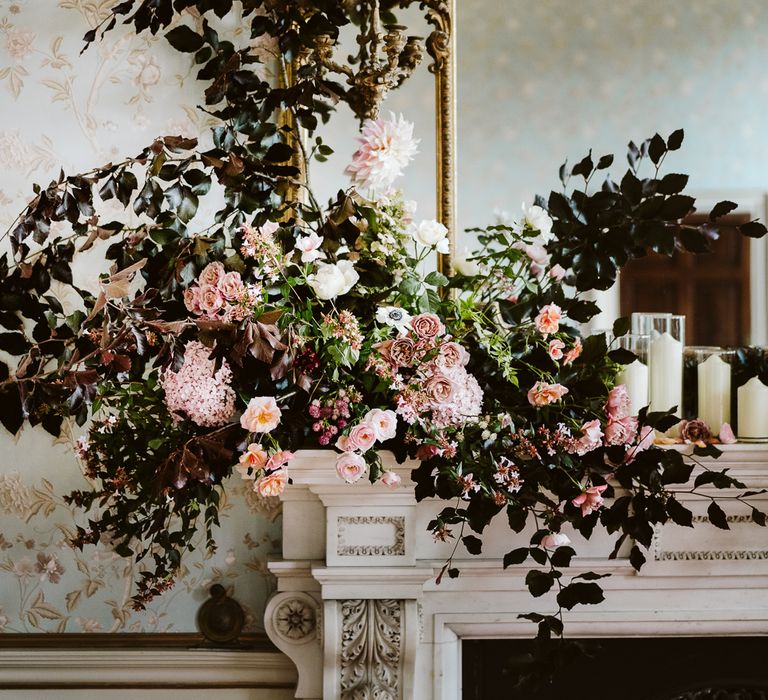 Floral Installation For Wedding On Fireplace // Image By John Barwood Photography