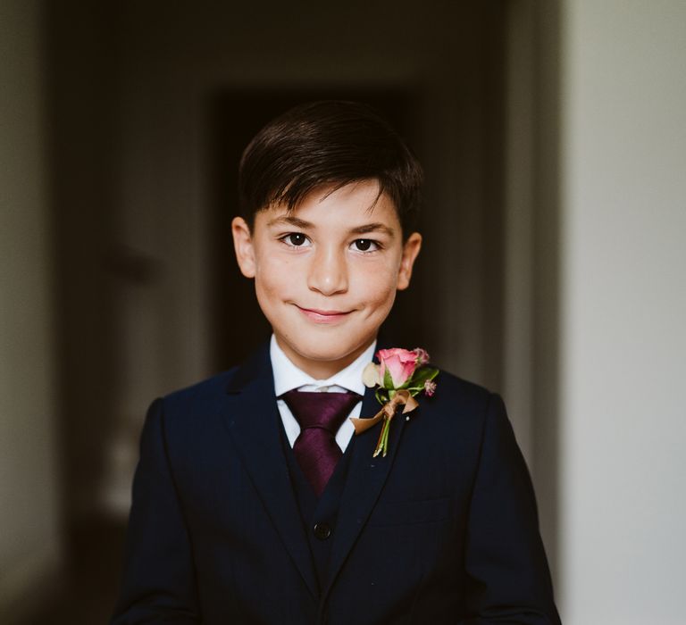 Page Boy With Burgundy Tie // Image By John Barwood